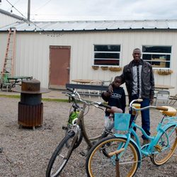 Missoula Free Cycles - Father and son with their freshly tuned up and fixed bicycles! We strive to find each bicycle donated to us a good home.