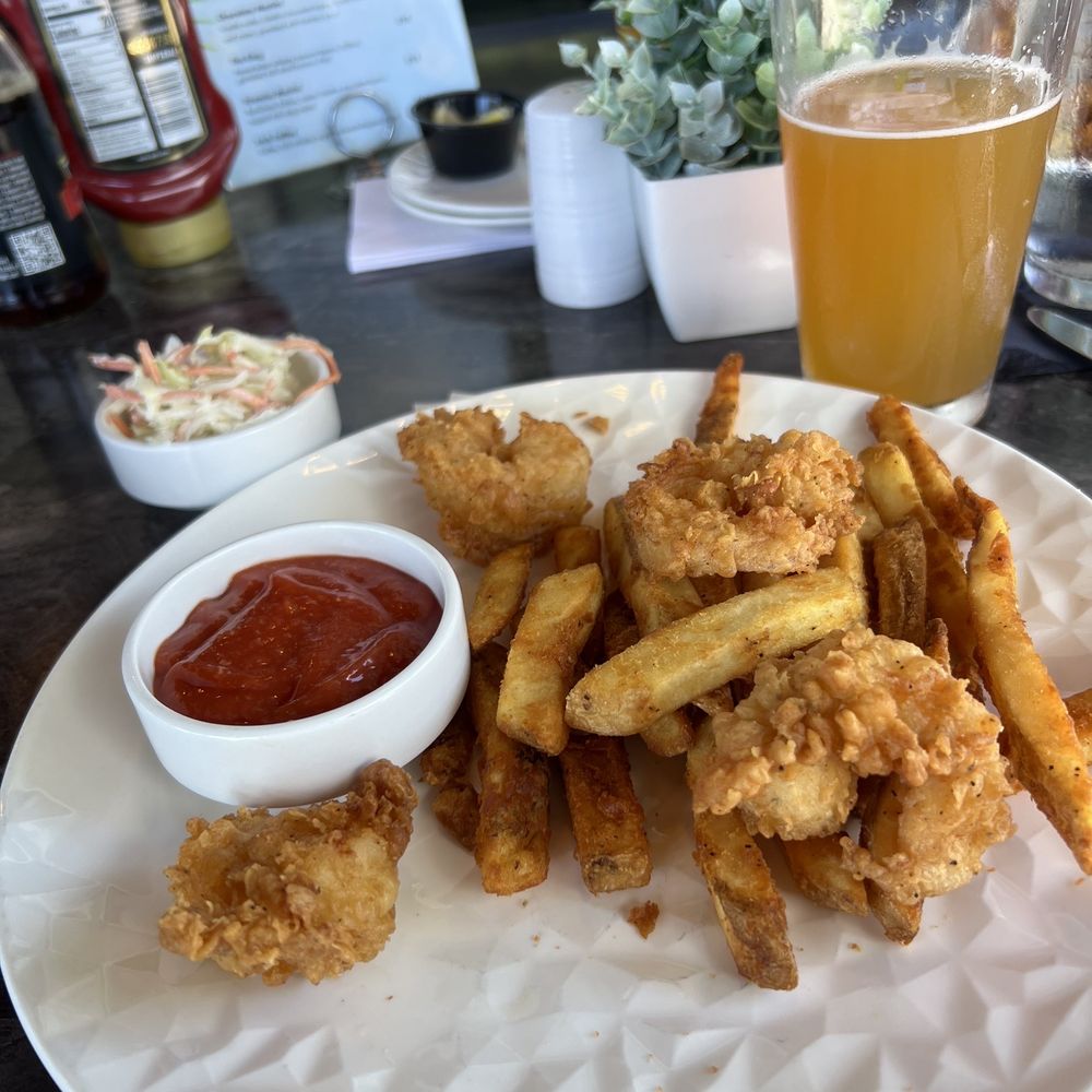 Lake Eustis Waterfront Grille - Fried shrimp and French fries. - Seafood Near Me - Eustis, Florida Lake Eustis Waterfront Grille - Fried shrimp and French fries. - Seafood Near Me - Eustis, Florida