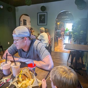 Millie's On Main - Interior - a few tables and a very large bar - Juice Bars & Smoothies Near Me - Harrison, Maine