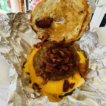 The Daily Fix - Sausage, egg, bacon, and cheese bagel - Donuts Near Me - New Kent, Virginia The Daily Fix - Sausage, egg, bacon, and cheese bagel - Donuts Near Me - New Kent, Virginia