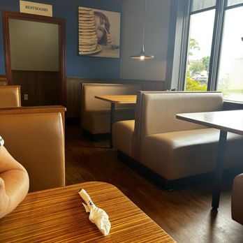 IHOP - Booths are a modern beige color that elevates the restaurant appearance - Breakfast & Brunch Near Me - ORLANDO, Florida