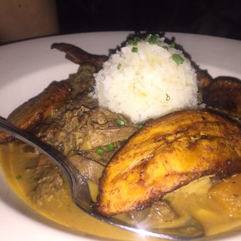 Highland Kitchen - Spicy Coconut Curry Goat Stew - New American Near Me - Somerville, Massachusetts