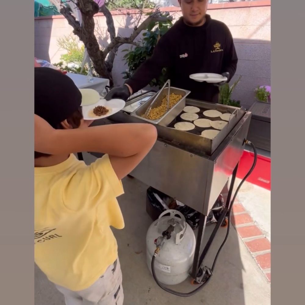 Tacos being served by Victor (Arturo's associate). Tacos being served by Victor (Arturo's associate).