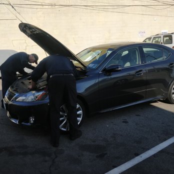 Glendale Lube Center - Checking the baby - Auto Repair Near Me - Glendale, California Glendale Lube Center - Checking the baby - Auto Repair Near Me - Glendale, California