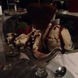 Victoria Asian Cuisine - Vanilla and honeycomb ice cream drenched in Bailey's, with whipped cream and chocolate sauce