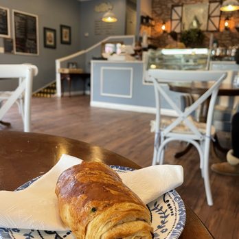 Le Vingt Trois Cafe & Bakery - Chocolate Croissant featuring the cute cottage wall where you can peep the chef baking - Bakeries Near Me - Herndon, Virginia Le Vingt Trois Cafe & Bakery - Chocolate Croissant featuring the cute cottage wall where you can peep the chef baking - Bakeries Near Me - Herndon, Virginia