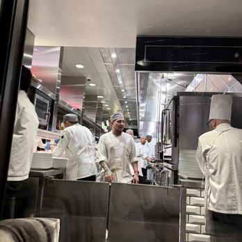 Steak 48 - Busy kitchen view behind glass - Steakhouses Near Me - Charlotte, North Carolina