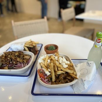 Greco - a plate of food on a table - Salad Near Me - Washington, DC, District of Columbia