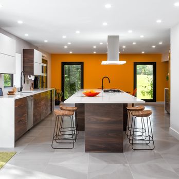 Reico Kitchen & Bath - a modern kitchen with orange walls - Kitchen & Bath Near Me - Springfield, Virginia Reico Kitchen & Bath - a modern kitchen with orange walls - Kitchen & Bath Near Me - Springfield, Virginia
