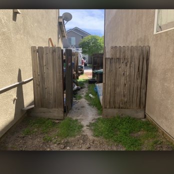 Send It Hauling & Junk Removal - Original fence, with junk still present: - Junk Removal & Hauling Near Me - Manteca, California