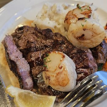 Brennecke's Beach Broiler - Ribeye steak with scallops (surf and turf) - Seafood Near Me - Koloa, Hawaii Brennecke's Beach Broiler - Ribeye steak with scallops (surf and turf) - Seafood Near Me - Koloa, Hawaii