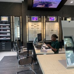 The Eye Place - Desk and glasses
