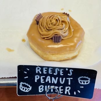 Sweet Apple Donut & Coffee - a sign that reads reese's peanut butter - Donuts Near Me - Alpharetta, Georgia Sweet Apple Donut & Coffee - a sign that reads reese's peanut butter - Donuts Near Me - Alpharetta, Georgia