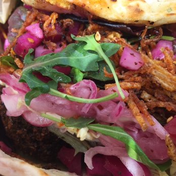 Dune - Falafel sando topped with veg and crispy onions (I think) yummm - Falafel Near Me - Los Angeles, California