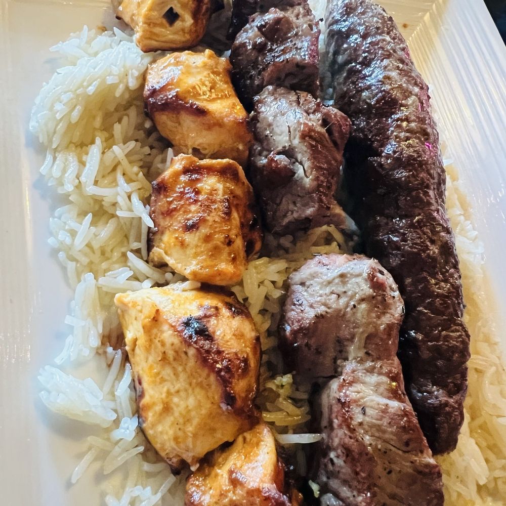 Open Sesame - Mixed Grill -- skewers of juicy perfection over delicious rice! - Lebanese Near Me - Dallas, Texas Open Sesame - Mixed Grill -- skewers of juicy perfection over delicious rice! - Lebanese Near Me - Dallas, Texas