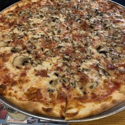 a pizza on a pan a pizza on a pan