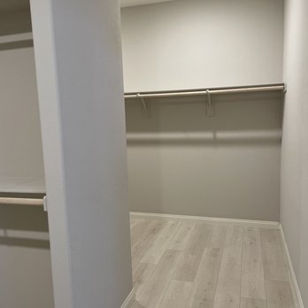 Shelves For Less - Before other side of MB closet - Cabinetry Near Me - Henderson, Nevada