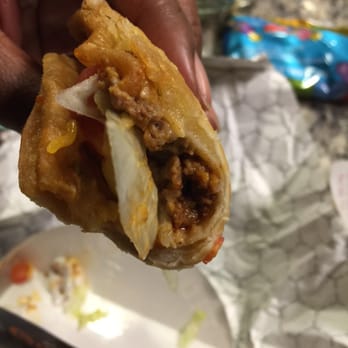 Taco Bell - That opaque glob between the mushy chalupa shell is supposed to be the cheesy cheese. *eyeroll* - Fast Food Near Me - Temecula, California