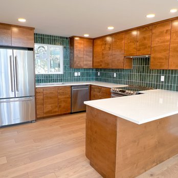 Van Pelt Construction - a kitchen with stainless steel appliances - General Contractors Near Me Van Pelt Construction - a kitchen with stainless steel appliances - General Contractors Near Me