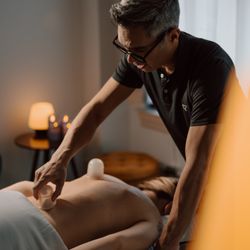 CityTouch Licensed Massage Therapy - Cupping therapy, a component of sports massage, helps loosen up tight fascia and muscle pain.
