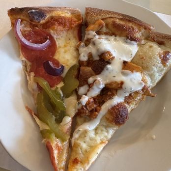 The Hornet’s Nest - two slices of pizza on a plate - Pizza Near Me - Hyndman, Pennsylvania The Hornet’s Nest - two slices of pizza on a plate - Pizza Near Me - Hyndman, Pennsylvania