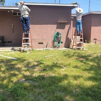 Craig and Sons Termite and Pest Control - Here they're gone all the way around the house finishing up in the back - Pest Control Near Me - Redlands, California