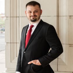 TDA Law Firm - Tim Allen, Attorney and Owner of TDA Law, PLLC in a Suit
