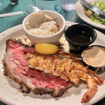 Austin's Cattle - Prime rib, rare, with shrimp and mashed potatoes - New American Near Me - Valdosta, Georgia Austin's Cattle - Prime rib, rare, with shrimp and mashed potatoes - New American Near Me - Valdosta, Georgia