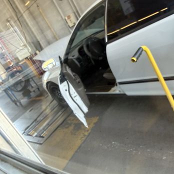 ADEQ Emissions Testing - M02 - My car off to the right side in dyno - Smog Check Stations Near Me - Glendale, Arizona