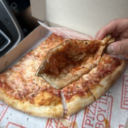Look how thin the crust is! Look how thin the crust is!
