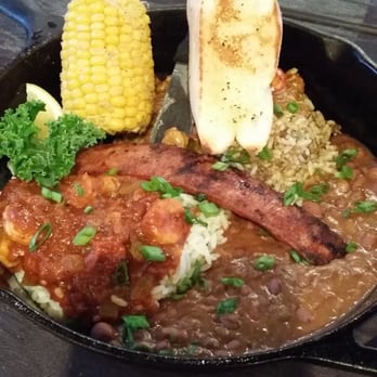 Razzoo's Cajun Cafe - Cajun Skillet... cajun shrimp,  red beans and rice, crawfish,  dirty rice, corn and bread. Yummm big portions! - Cajun/Creole Near Me - Tyler, Texas