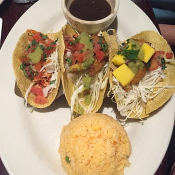 Maggie McFly's - Street tacos...you get to pick three kinds from the list. Served with cheesy rice! - New American Near Me - Brookfield, Connecticut Maggie McFly's - Street tacos...you get to pick three kinds from the list. Served with cheesy rice! - New American Near Me - Brookfield, Connecticut