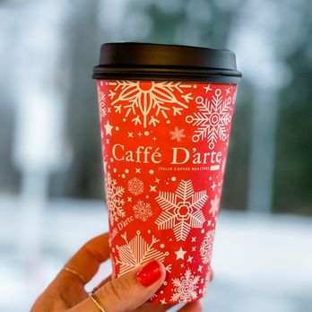 Cedar River Espresso - a hand holding a cup of coffee - Coffee & Tea Near Me - Renton, Washington