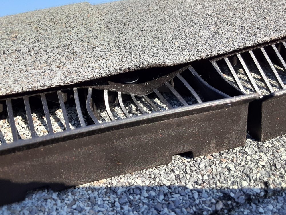 Slide of Grassi Roofing