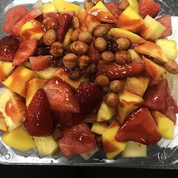 Disfruta - Tostimix-Tostitos,cucumber,jicama,pineapple,strawberry, mango,watermelon,shelled peanuts,chili powder,salt,lime,chamoy,hot sauce,pork grinds - Desserts Near Me - San Marcos, California