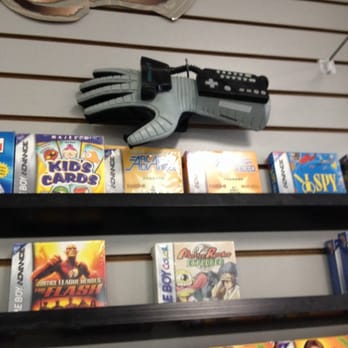 Videogames Then & Now - A Power Glove but is display only. - Video Game Stores Near Me - Harwood Heights, Illinois Videogames Then & Now - A Power Glove but is display only. - Video Game Stores Near Me - Harwood Heights, Illinois