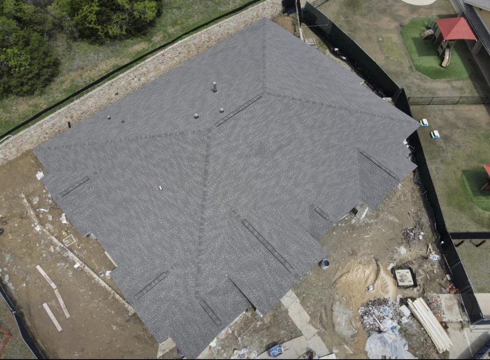 Slide of JCrew Roofing and Construction