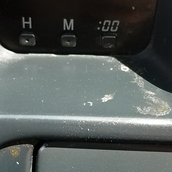 Ultra Touch Car Wash - This is on the dash. Where the clock is. AFTER the supposed "cleaning" and "detailing". All of that is dirt. - Car Wash Near Me - Boise, Idaho