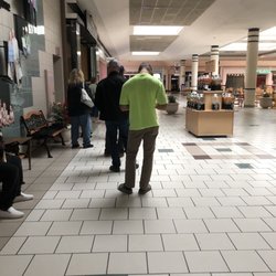 DMV - Only 10 people deep 15 min before they open. All indoors waiting area, in the mall food court