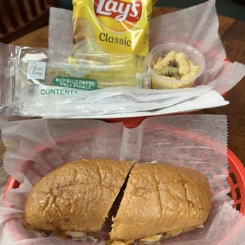 The Foxhole - Baja Chicken Sandwich. All sandwiches served on a brioche sub roll with chips, pickle spear, & pasta salad. 5/5 - Sandwiches Near Me - Williamsport, Indiana The Foxhole - Baja Chicken Sandwich. All sandwiches served on a brioche sub roll with chips, pickle spear, & pasta salad. 5/5 - Sandwiches Near Me - Williamsport, Indiana