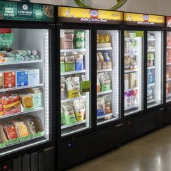 11 Freezer doors of fresh and frozen gently cooked and raw dog and cat food diets.