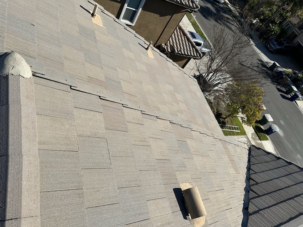 Slide of Aloha Bros Roof Cleaning