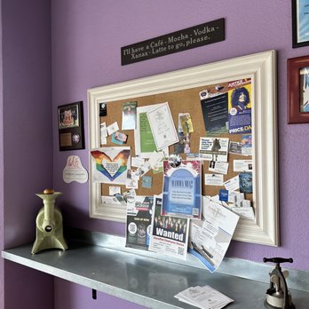 Juice & Java Express - a purple wall with a bulletin board - Juice Bars & Smoothies Near Me - Pleasanton, California