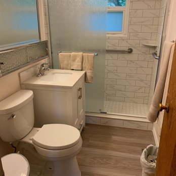 Reilex Construction - Everything brand new in 68 year old bathroom (Mom's favorite mirror/cabinet was reinstalled). - Tiling Near Me