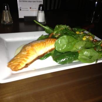 Eureka! - Pan seared salmon w/ salad and roasted veggies (hold the avocado)... Tasty but overpriced at $17.99 for such a small cut of fish - American Near Me - Hawthorne, California