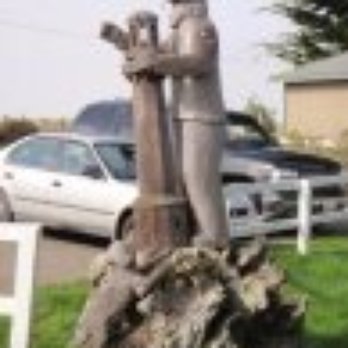 Rollerville Cafe - Wooden sculpture right outside - American Near Me - Point Arena, California Rollerville Cafe - Wooden sculpture right outside - American Near Me - Point Arena, California
