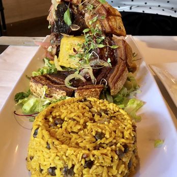 Mofongo - Chuleta Can Can & arroz con gandules - Puerto Rican Near Me - Miami, Florida Mofongo - Chuleta Can Can & arroz con gandules - Puerto Rican Near Me - Miami, Florida