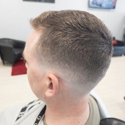 Premier Barber Lounge and Salon - Low bald taper on a Terrific Tuesday with "The Godfather"..