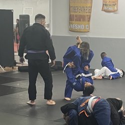 Moore's Karate & Kung Fu - She has a blast.