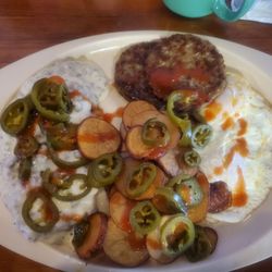 Friendly Bar & Grill - Breakfast special with added jalapeños and hot sauce. I get 2 Breakfasts out of this